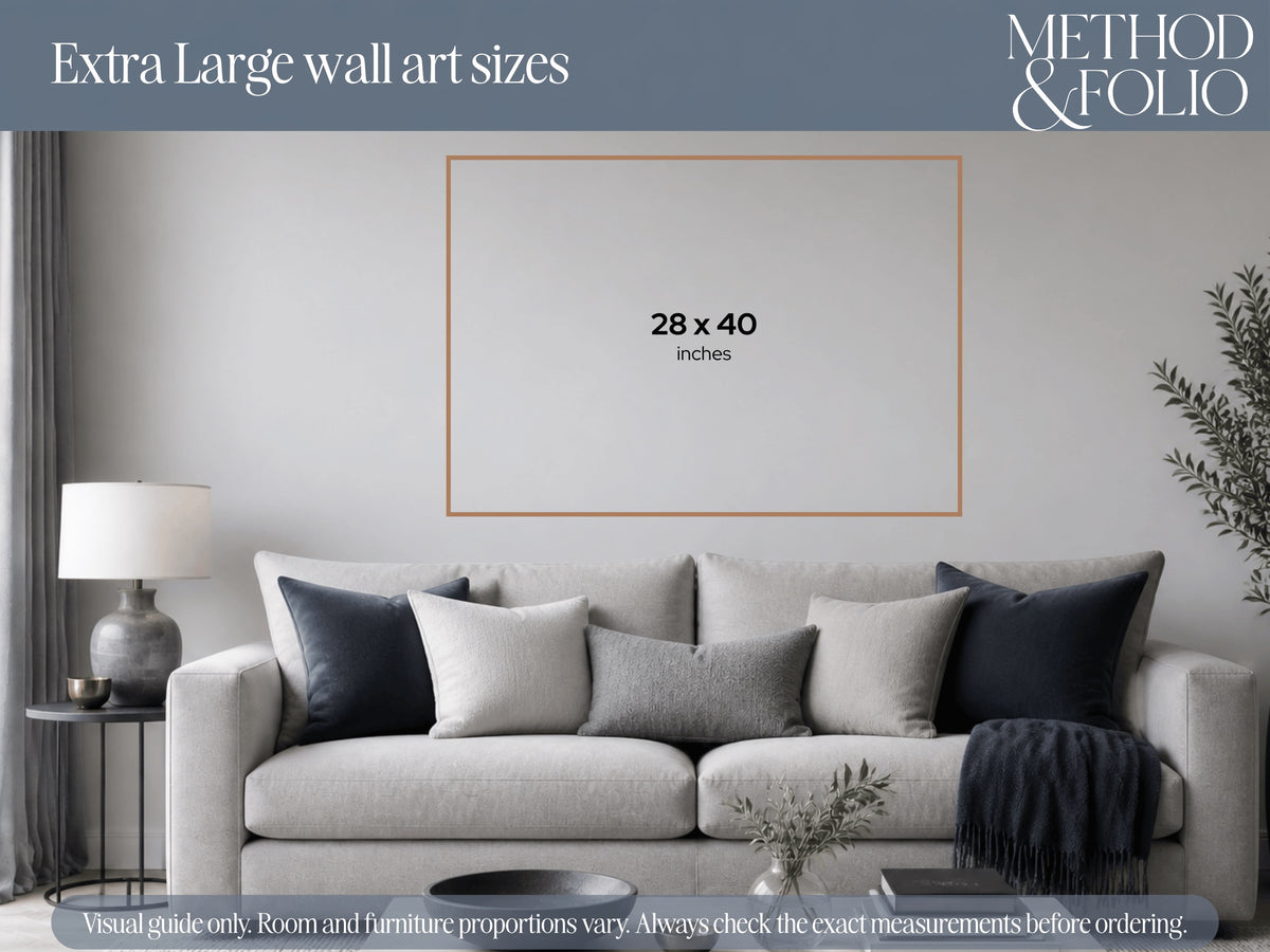 Visual wall-size guide showing a 28 × 40 inch print above a sofa.